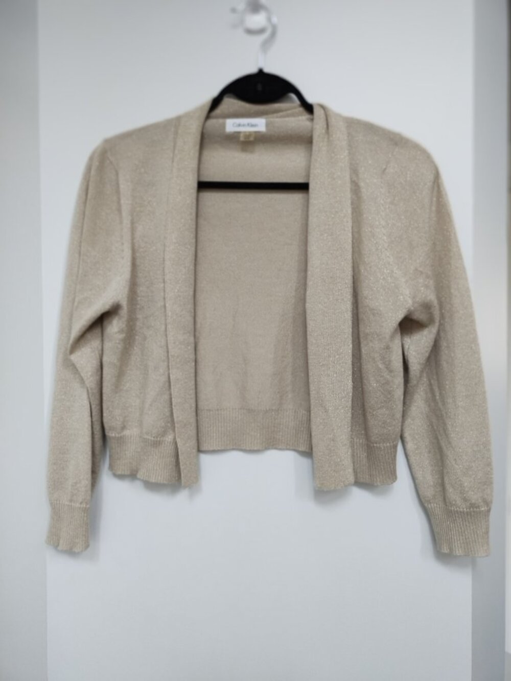 Calvin Klein bolero with gold sparkle threading